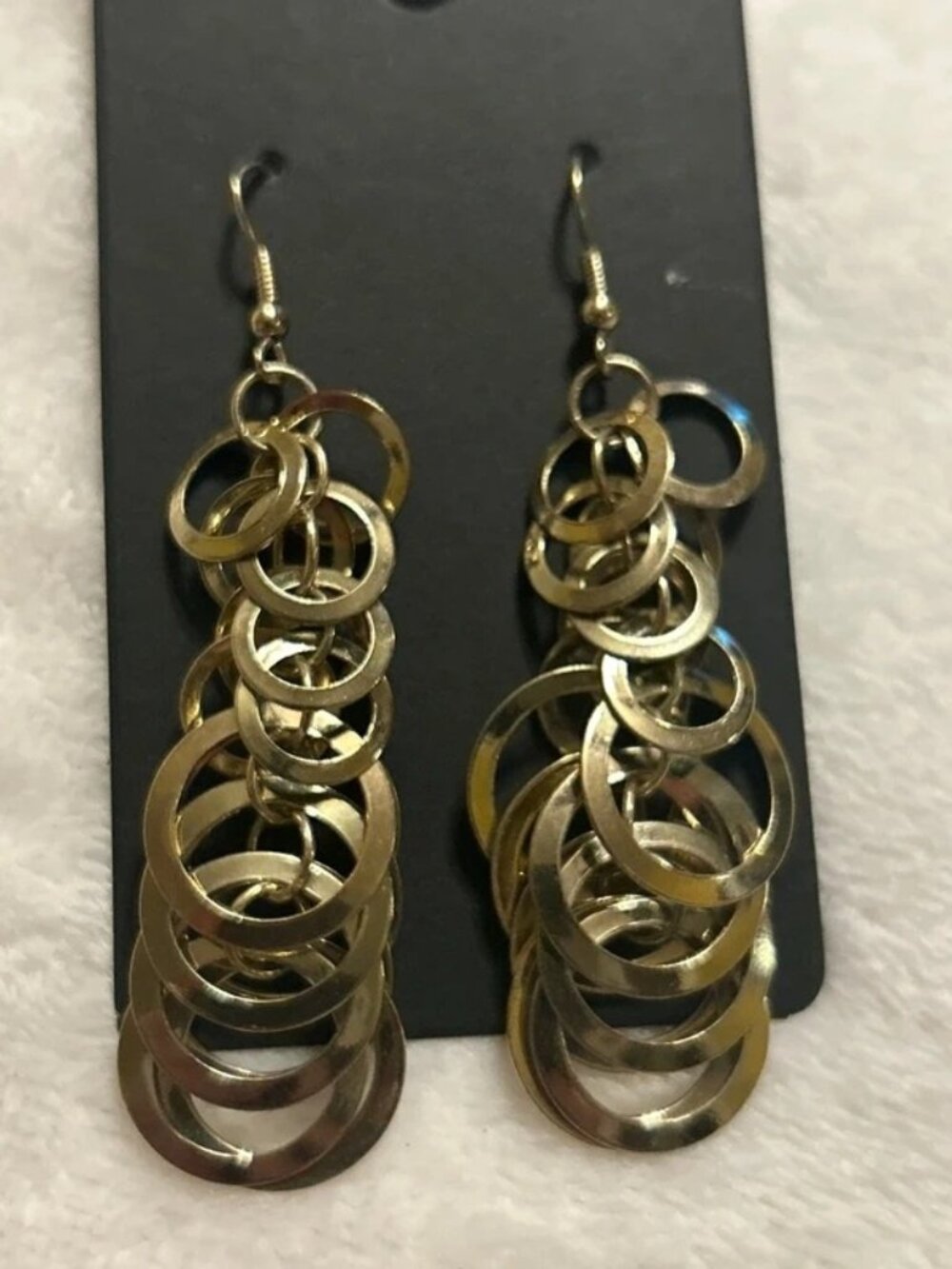 Dangled silver tone earrings
